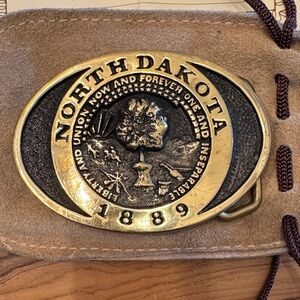 North Dakota 1889 solid brass belt buckle. Registered. Never used